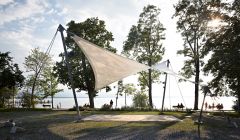 Four point sail, Chieming – translucent shade sail made of PTFE-glass fabric